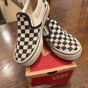 Vans Black and White Checkerboard Slip-Ons